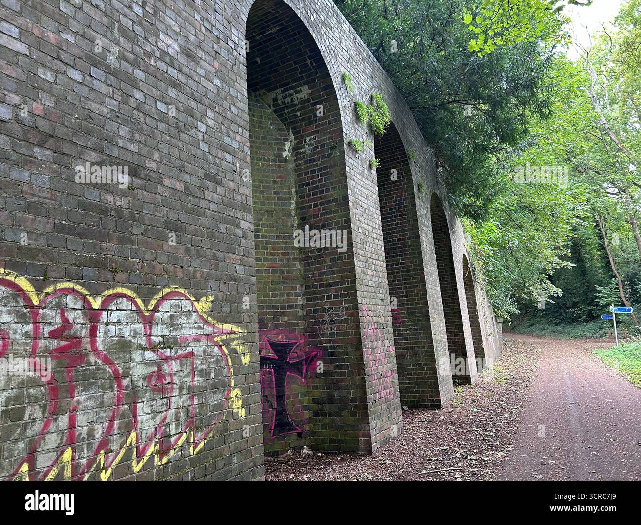Old railway arches with graffiti on the Nickey Line, Harpenden Stock ...