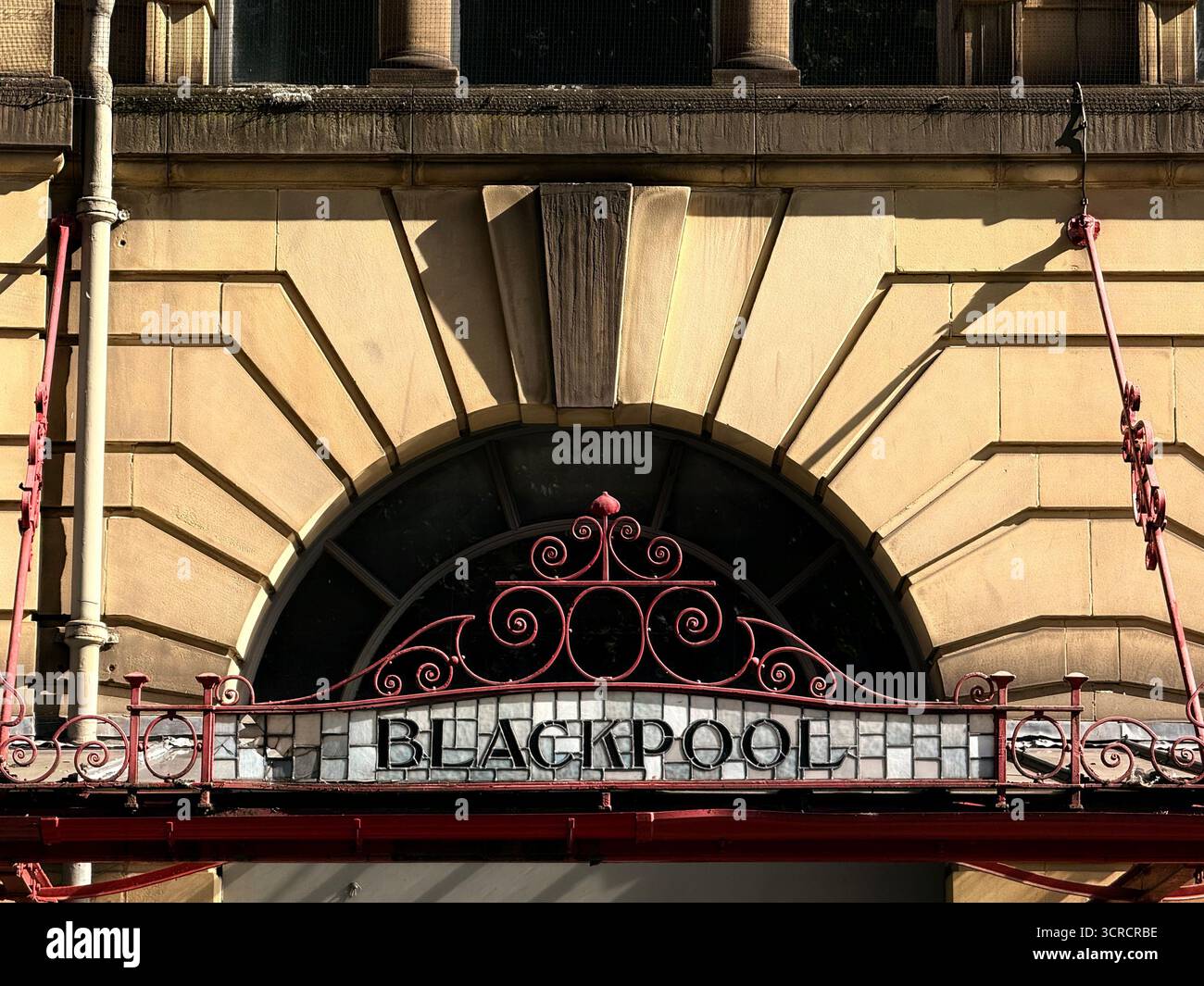 Vintage sign for Blackpool above entrance to Manchester Victoria railway station - Smartphone Captured Stock Image