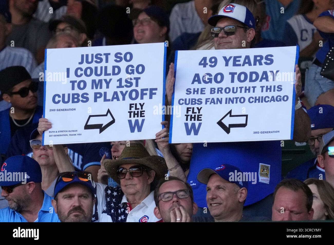 Cubs Inning Sign Chicago Cubs fans hold signs during the third inning of Game 1 of a ...