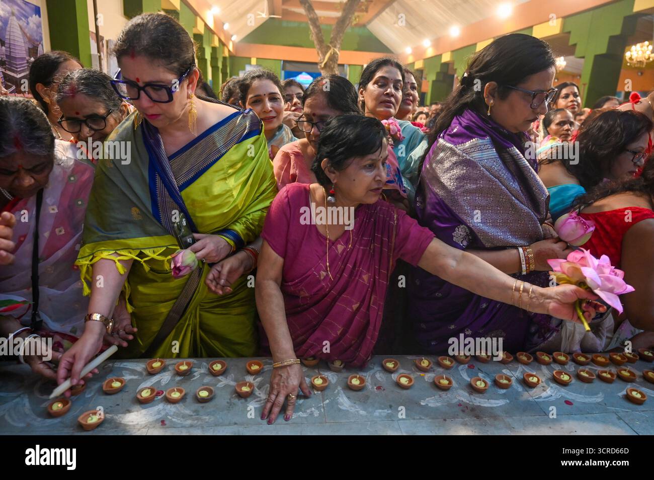 New Delhi, India. 30th Sep, 2025. NOIDA, INDIA - SEPTEMBER 30: Devotees ...
