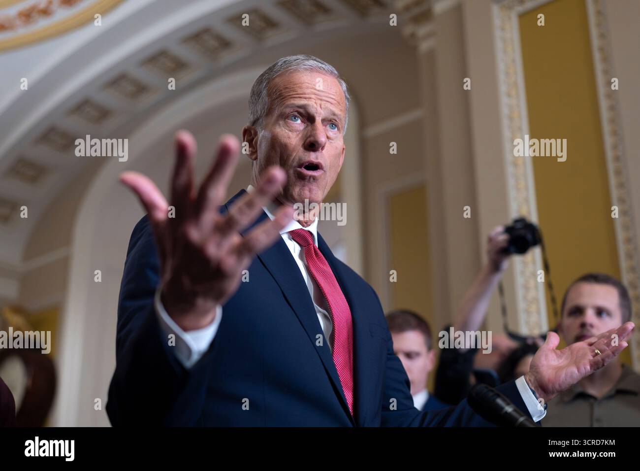 Senate Majority Leader John Thune, R-S.D., gestures while speaking with ...
