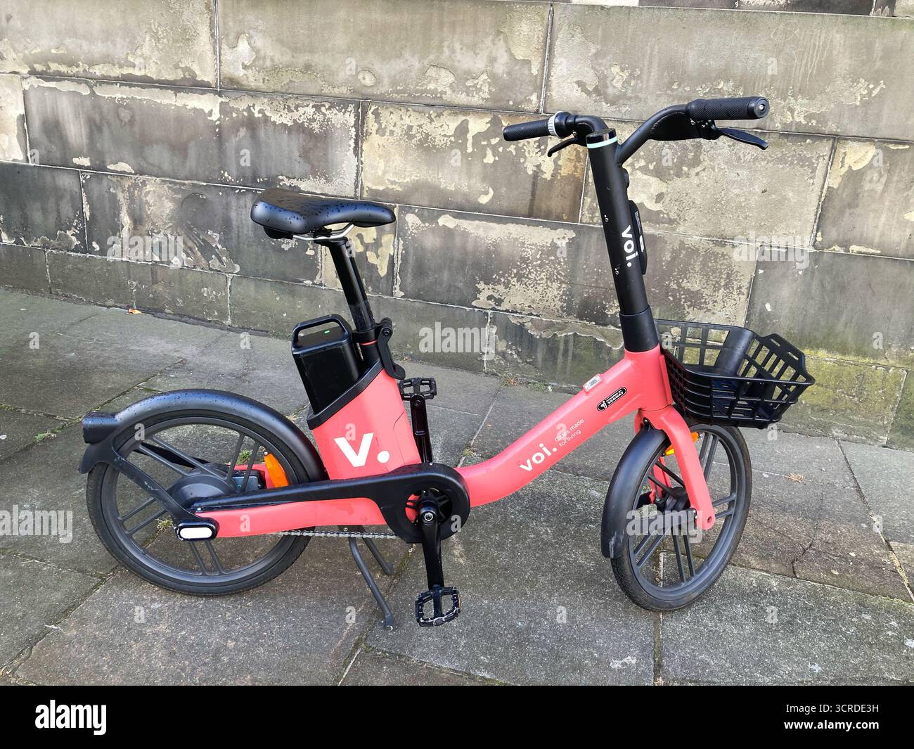 Voi e-bikes in street, cycle hire scheme in Edinburgh operated by Voi, Edinburgh Scotland - Smartphone Captured Stock Image