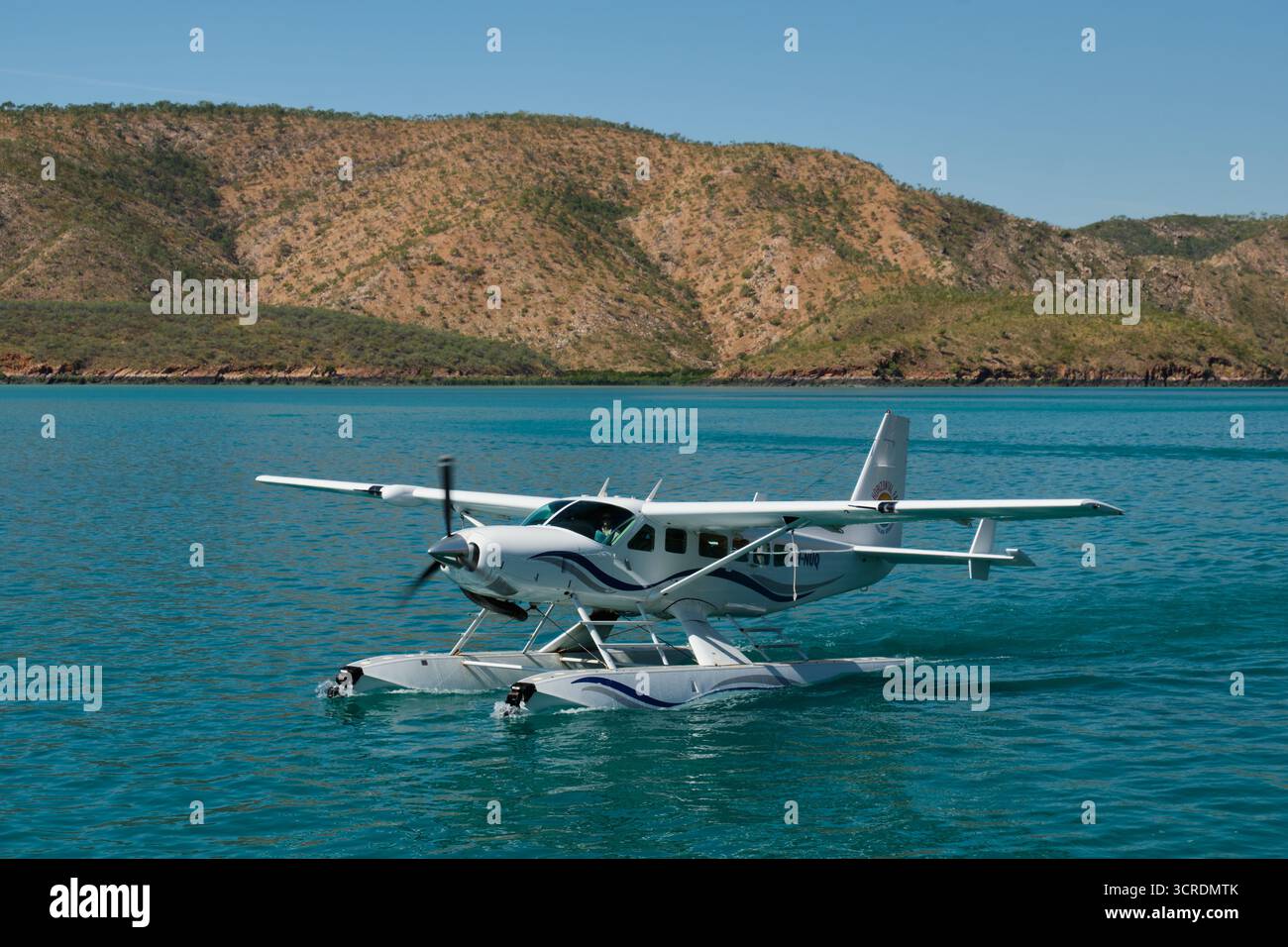 Taxiing seaplane just after landing on water - Talbot Bay, WA, Australia Stock Photo