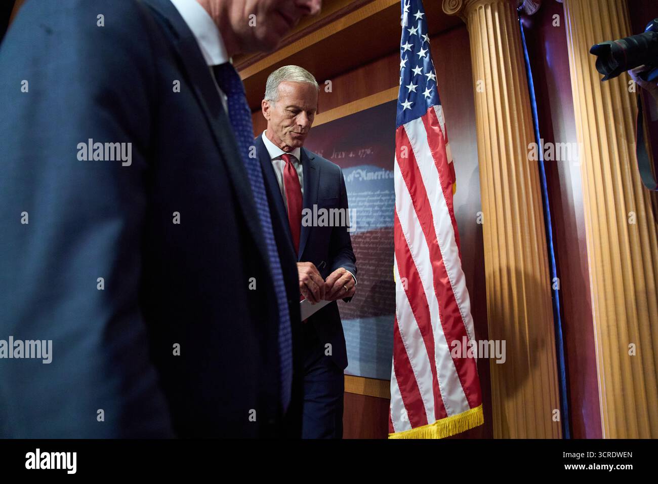 Senate Majority Leader John Thune, R-S.D., right, leaves after a news ...