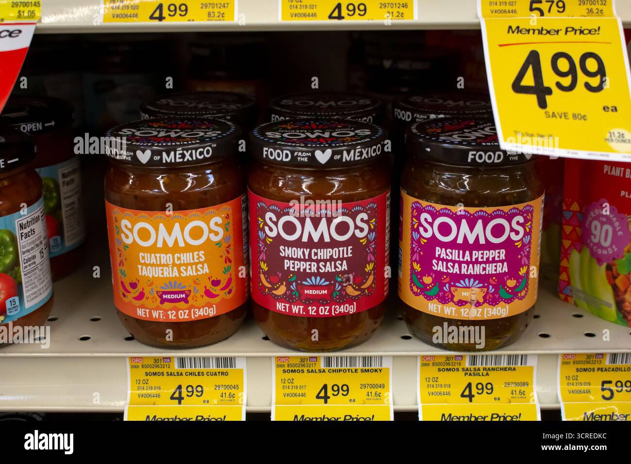 Los Angeles, California, United States - 05-20-2022: A view of several jars of Somos canned salsa, on display at a local grocery store. Stock Photo