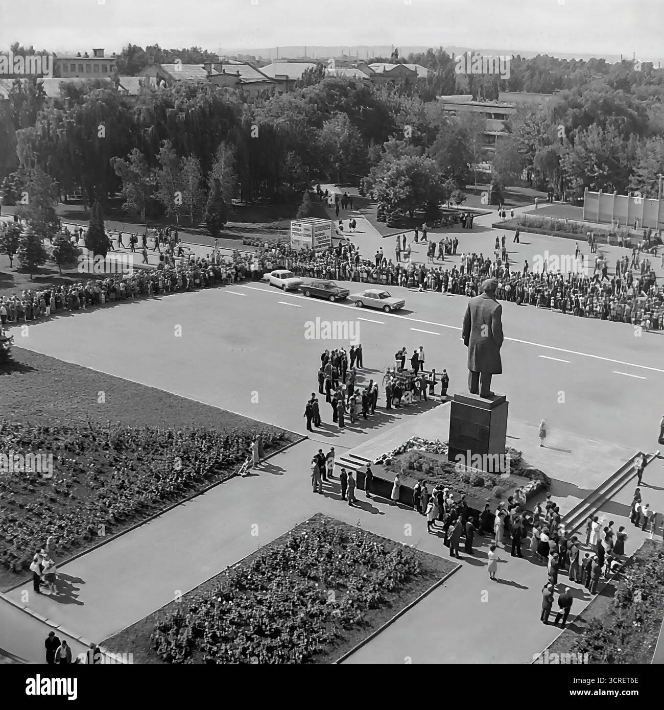 An authentic black and white aerial view from the 1980s captures a ...