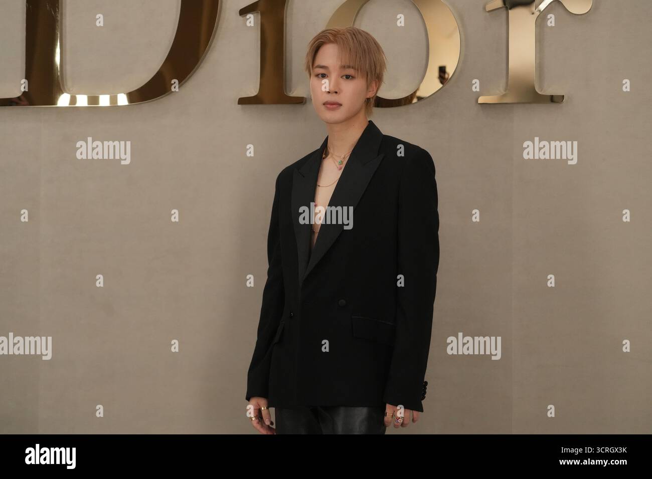 Jimin poses before the Dior Spring/Summer 2026 collection presented in ...