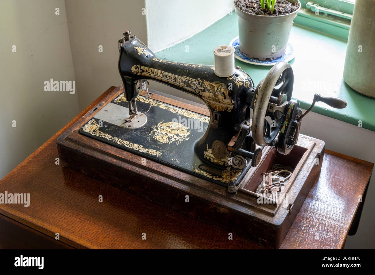 Antique Singer sewing machine Stock Photo