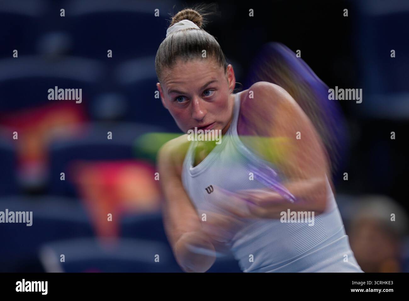 marta-kostyuk-of-ukraine-plays-a-forehand-return-to-jessica-pegula-of
