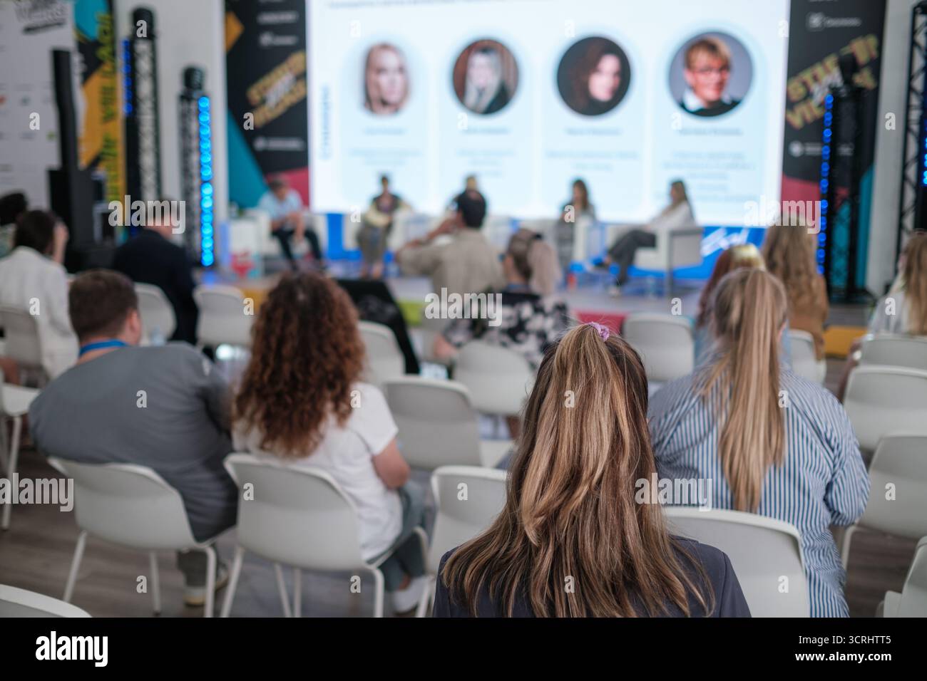 Panel talk with chairs microphone hi-res stock photography and images ...