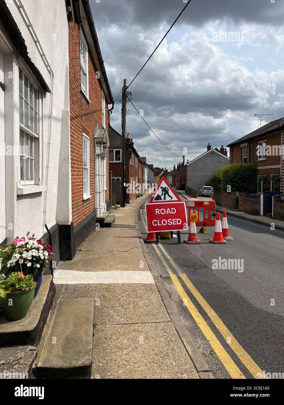 repair, temporary, road closed sign, signpost, sign, british, red, barrier, blocked, safety, street, uk, english, warning, road closed, traffic cones, - Smartphone Captured Stock Image