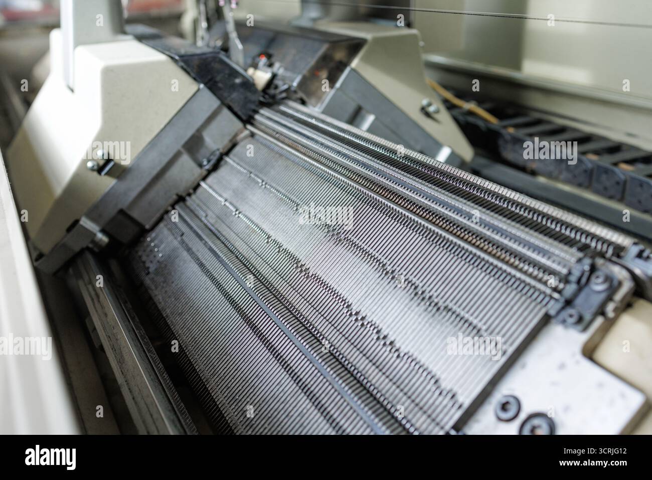 Knitting Machine Operations Industrial interlock circular knitting machine hi-res stock photography ...