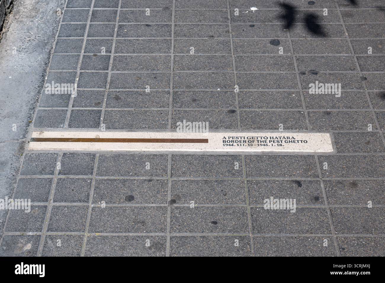 A sign marking the location of the Jewish ghetto wall  during World War II in Kazinczy utca in Budapest, Hungary Stock Photo
