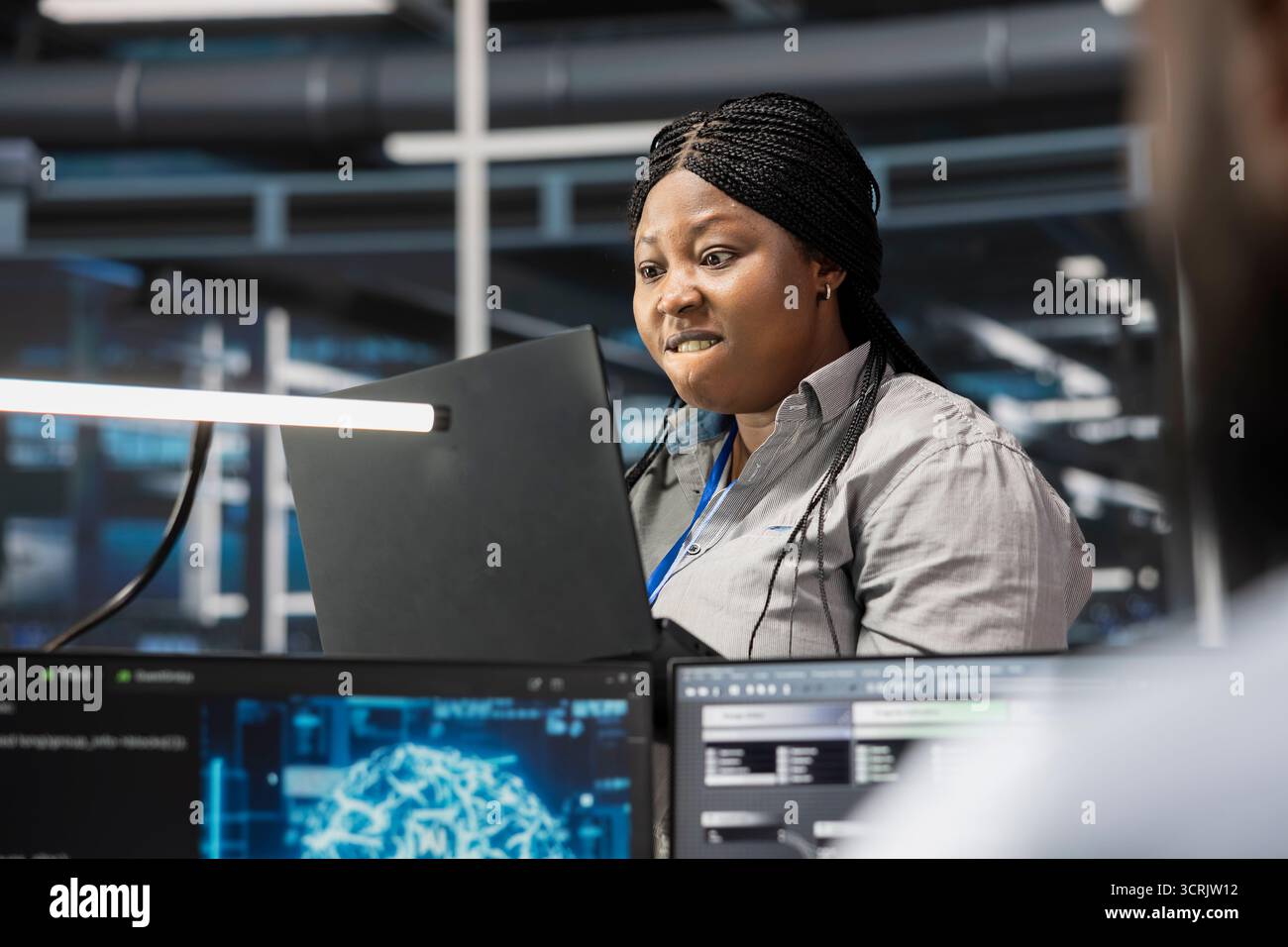 Annoyed data center expert hi-res stock photography and images - Alamy