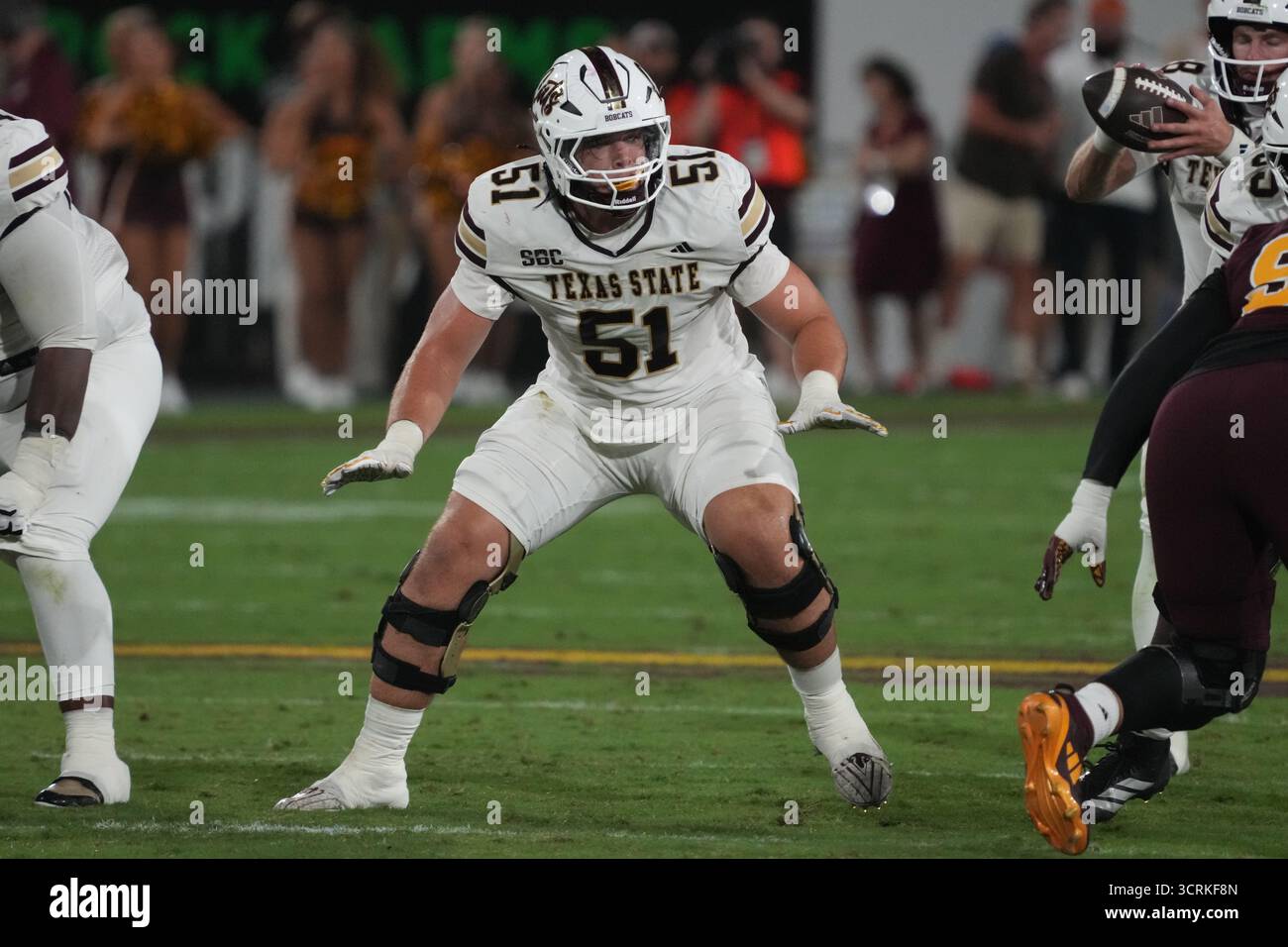 Texas State offensive lineman Brock Riker (51) in the first half of an ...