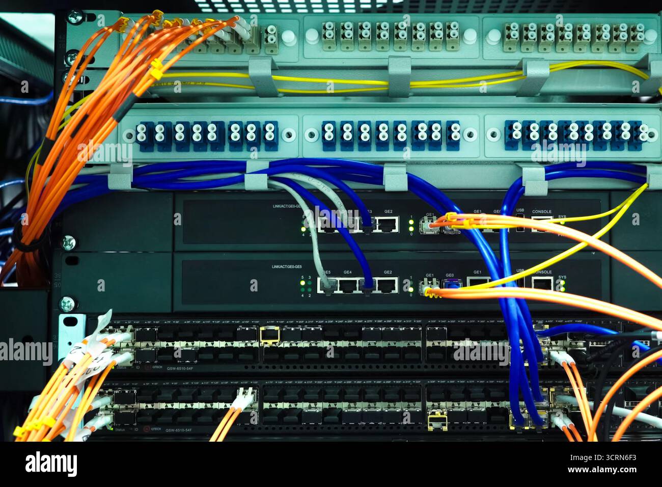 A working server. Internet wires and flashing lights on the server ...