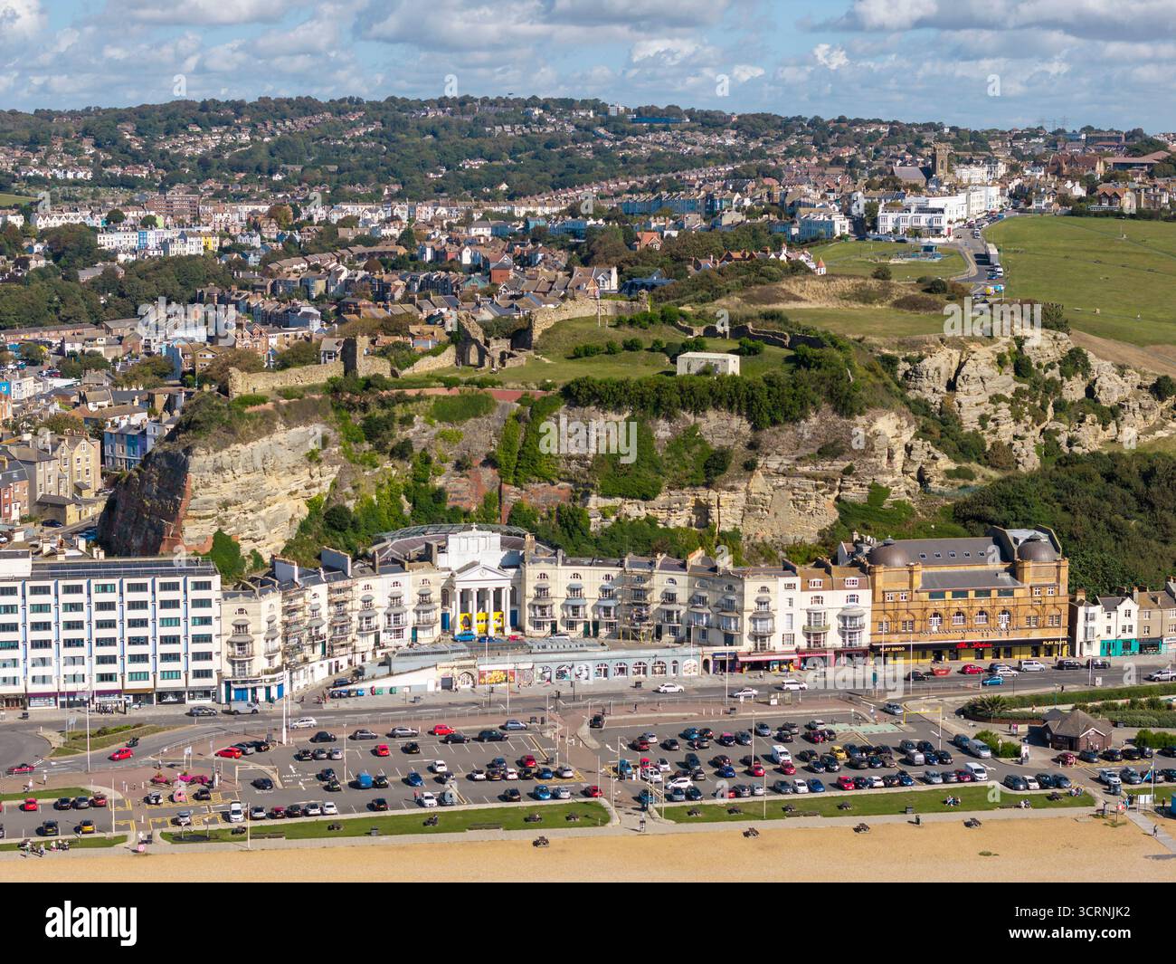 HASTINGS, EAST SUSSEX, ENGLAND - SEPTEMBER 09, 2025: Hastings Castle Ruins and East Cliff, East Sussex England Stock Photo