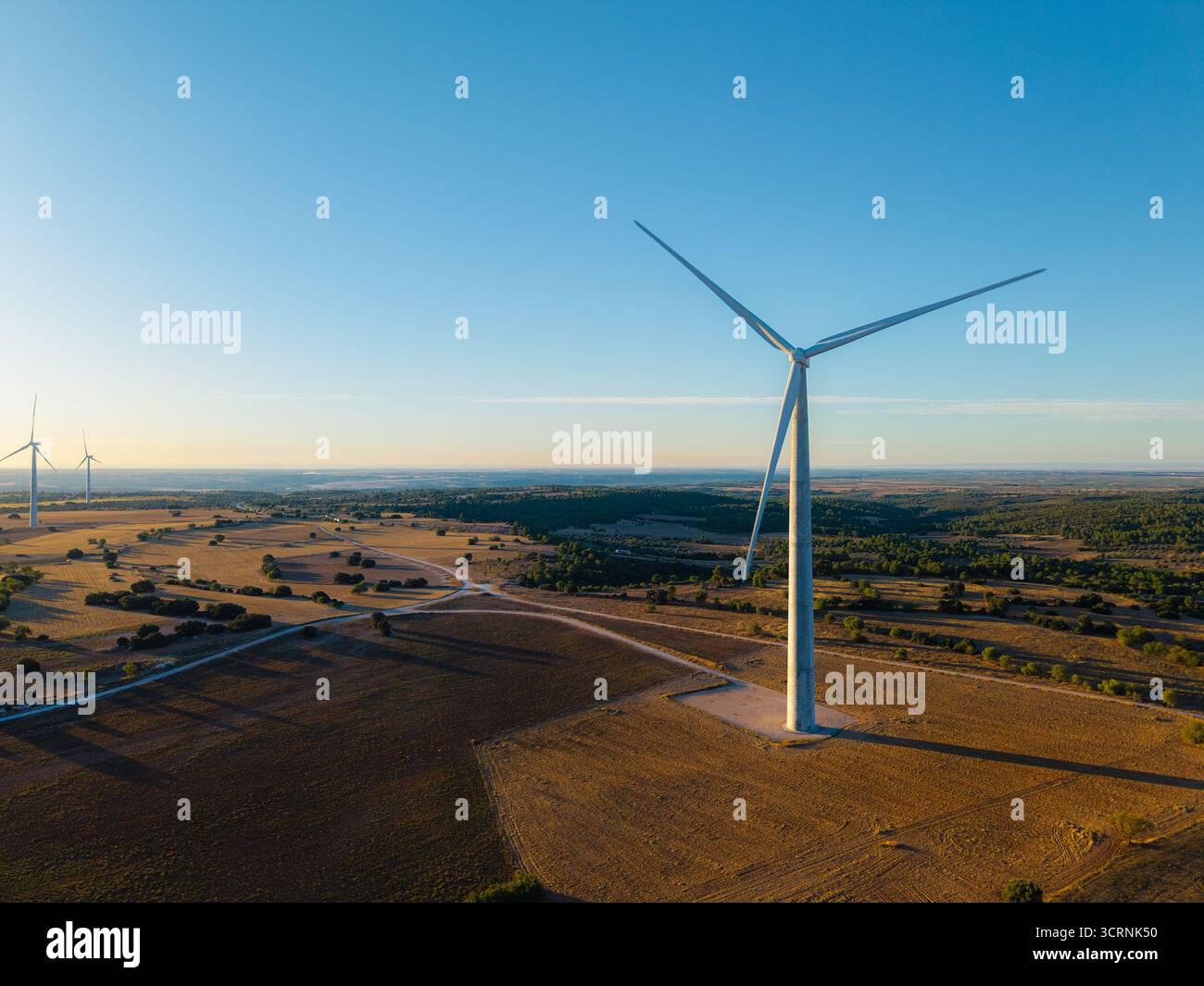 Early morning aerial image of a wind turbine in the Spanish countryside ...