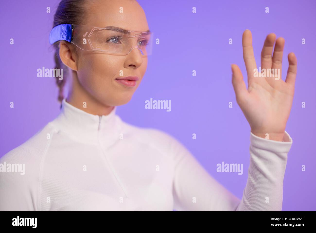 Woman Using Futuristic Augmented Reality Glasses Stock Photo
