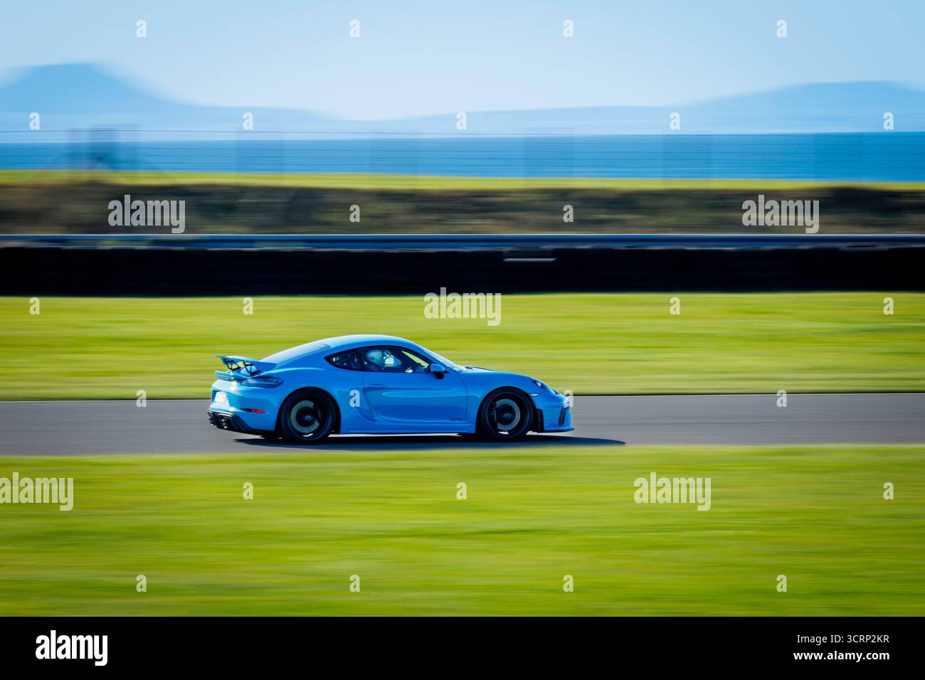 Pro Am Racing Anglesey Porsche sports car on Anglesey racing circuit during Mission Motorsport ...