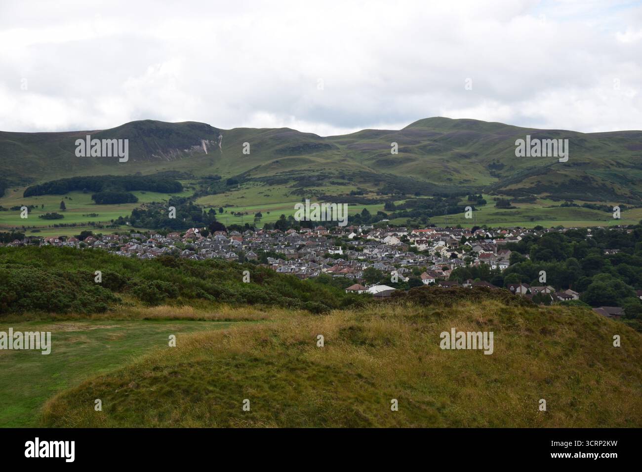 A wide view of the Pentland Hills and it's surrounding area on a cloudy day, taken from the Braid Hills Stock Photo