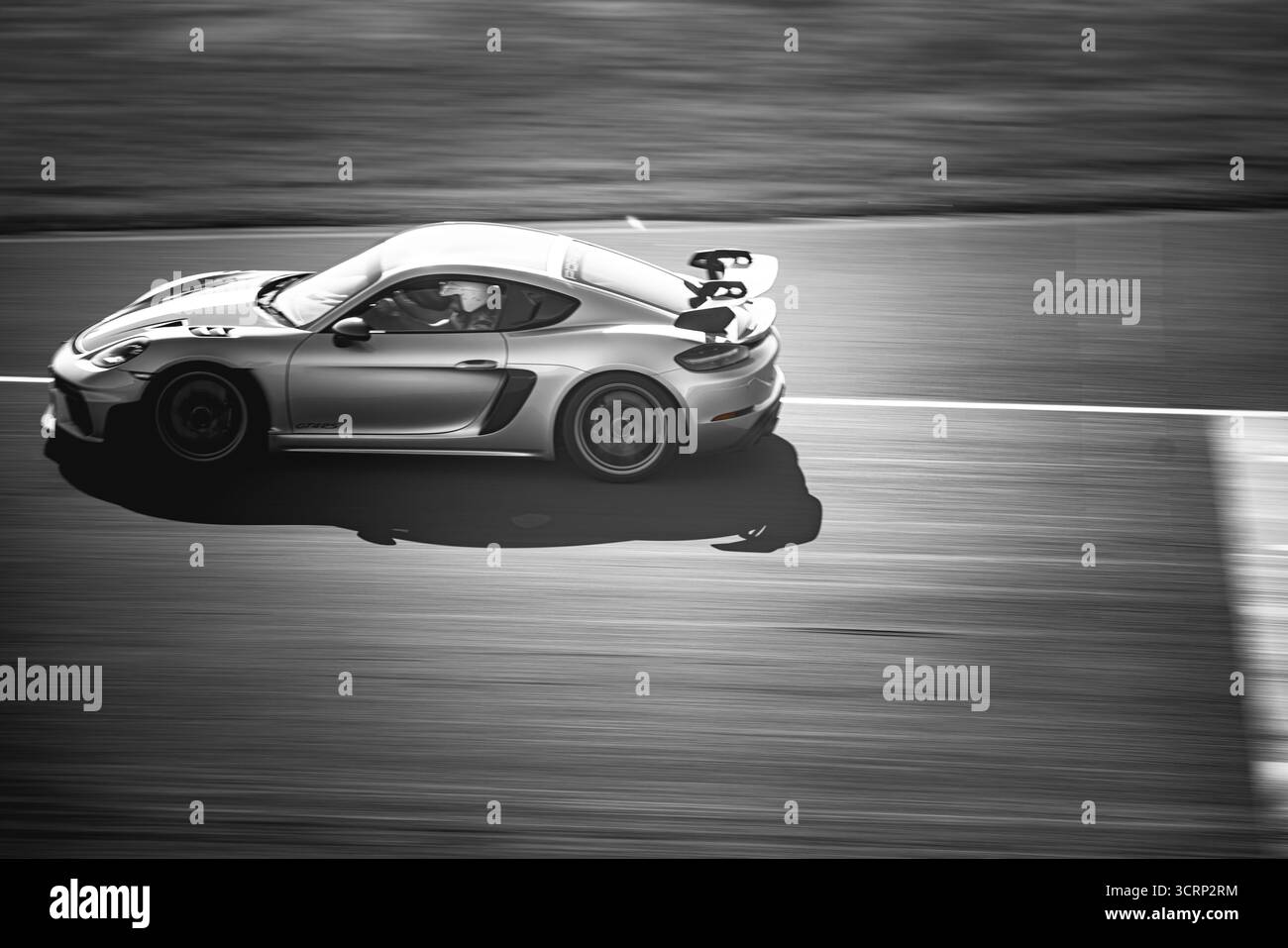 Pro Am Racing Anglesey Porsche sports car on Anglesey racing circuit during Mission Motorsport ...