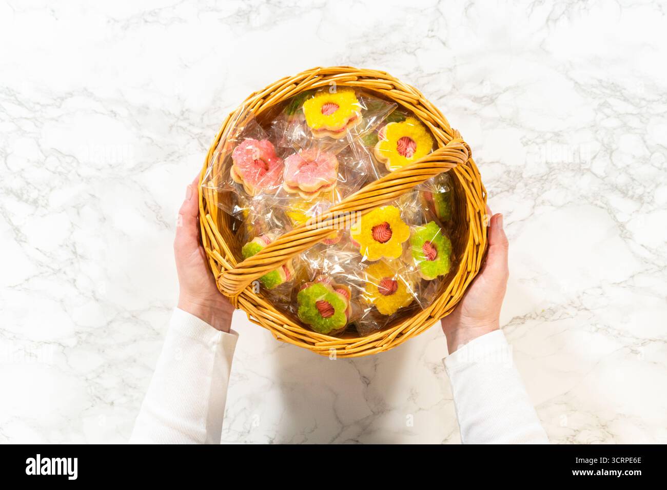 Wrapped Flower Cookies in Easter Basket Stock Photo
