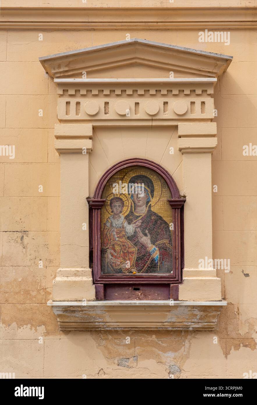 greek tabernacle or icon outside of a greek orthodox church in greece, sacred icons and and mother and child religious icon Stock Photo
