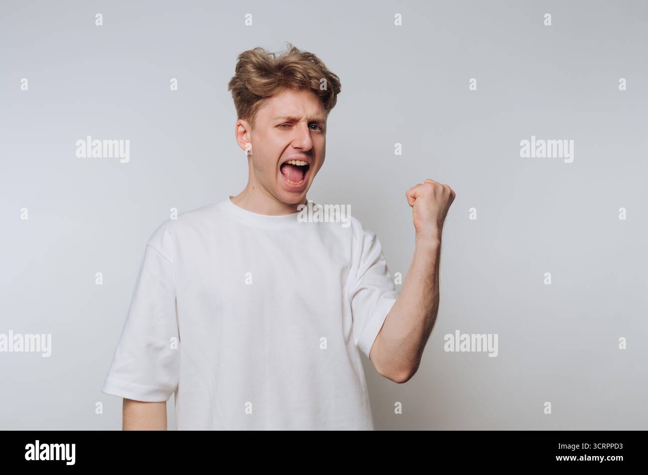 Man excited fist pump hi-res stock photography and images - Alamy