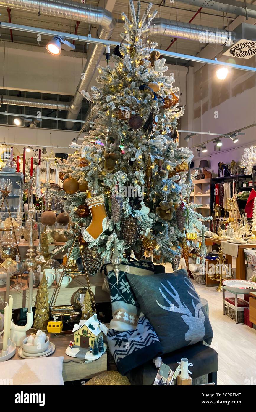 SLOVAKIA, POPRAD - DECEMBER 29, 2024: The city center of Poprad glows with a magical Christmas atmosphere, featuring festive lights, decorated trees, - Smartphone Captured Stock Image