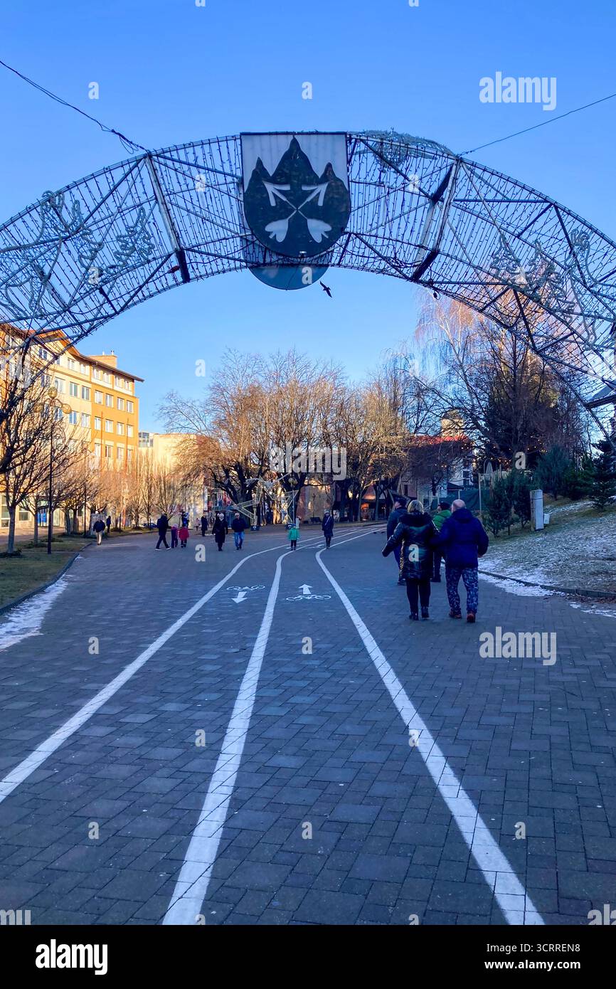 SLOVAKIA, POPRAD - DECEMBER 29, 2024: The city center of Poprad glows with a magical Christmas atmosphere, featuring festive lights, decorated trees, - Smartphone Captured Stock Image