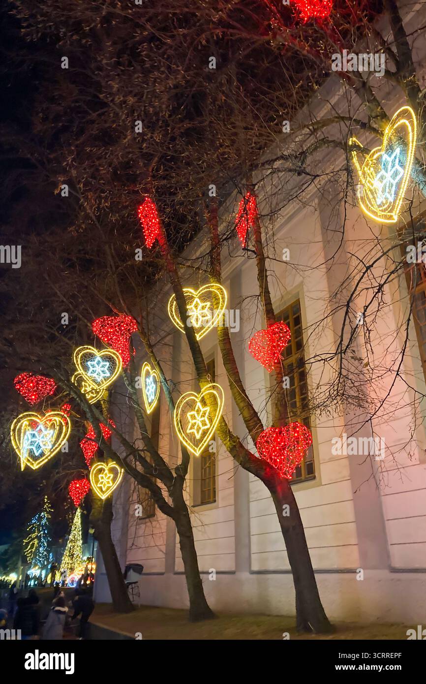 SLOVAKIA, POPRAD - DECEMBER 29, 2024: The city center of Poprad glows with a magical Christmas atmosphere, featuring festive lights, decorated trees, - Smartphone Captured Stock Image