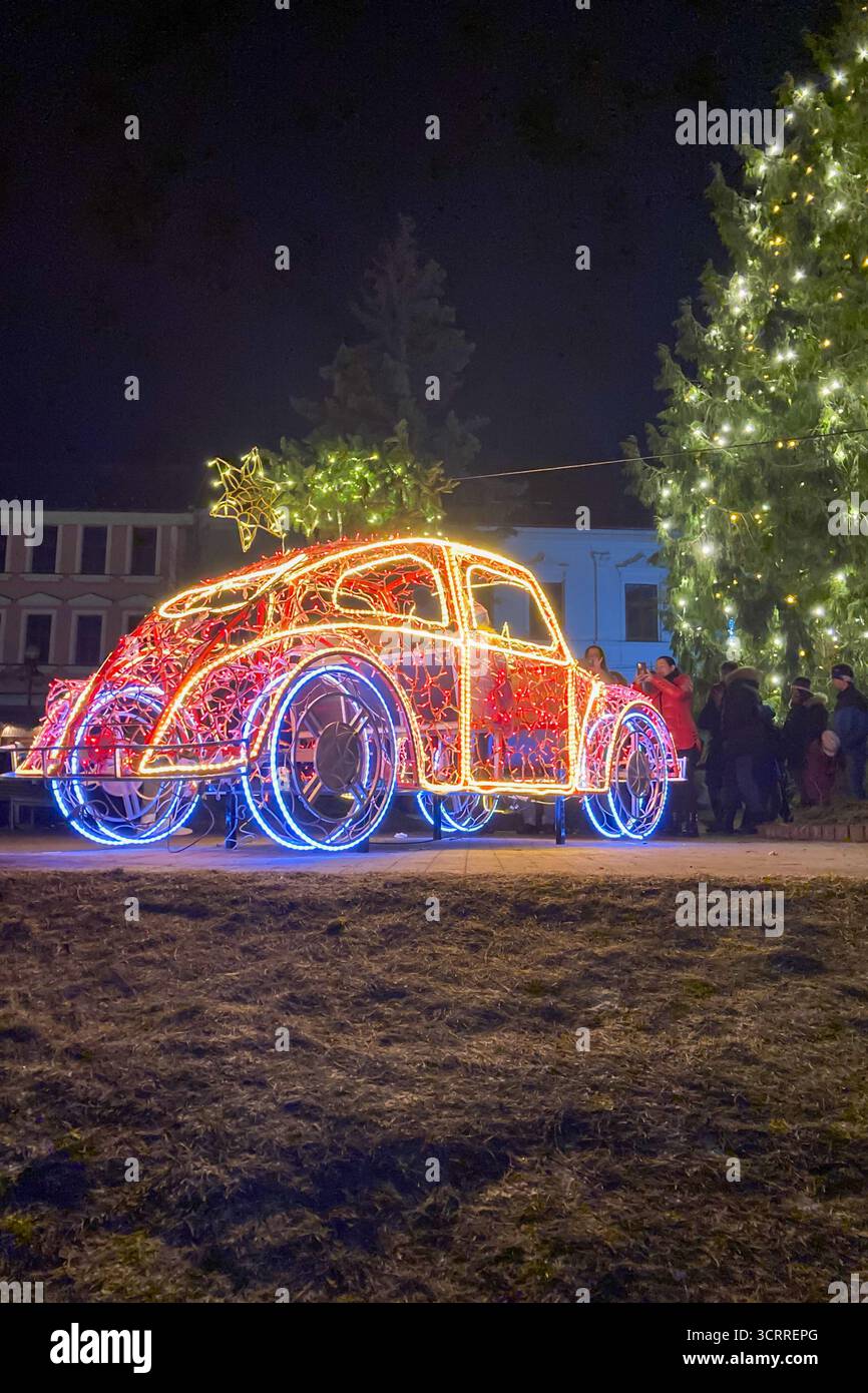 SLOVAKIA, POPRAD - DECEMBER 29, 2024: The city center of Poprad glows with a magical Christmas atmosphere, featuring festive lights, decorated trees, - Smartphone Captured Stock Image