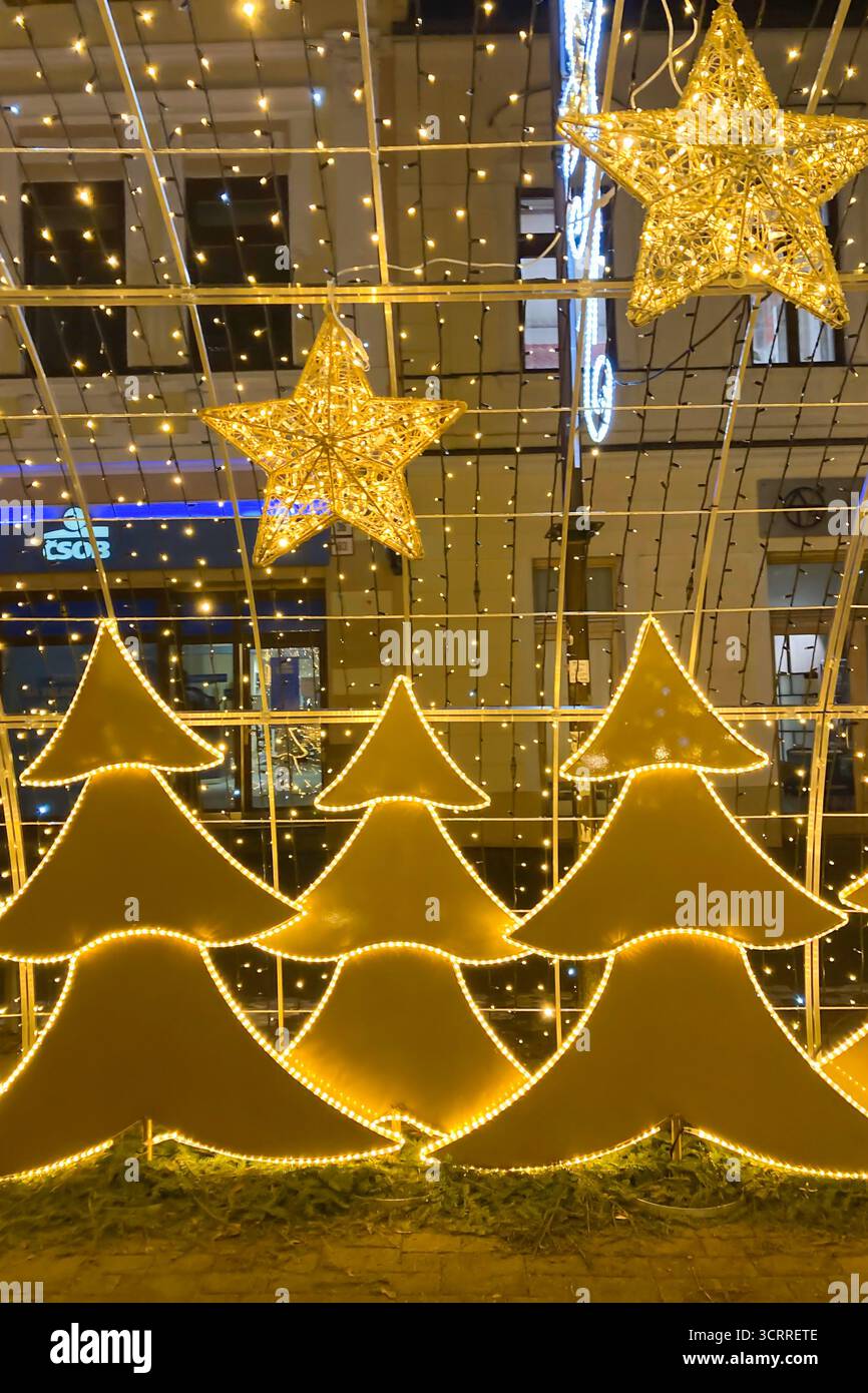 SLOVAKIA, POPRAD - DECEMBER 29, 2024: The city center of Poprad glows with a magical Christmas atmosphere, featuring festive lights, decorated trees, - Smartphone Captured Stock Image