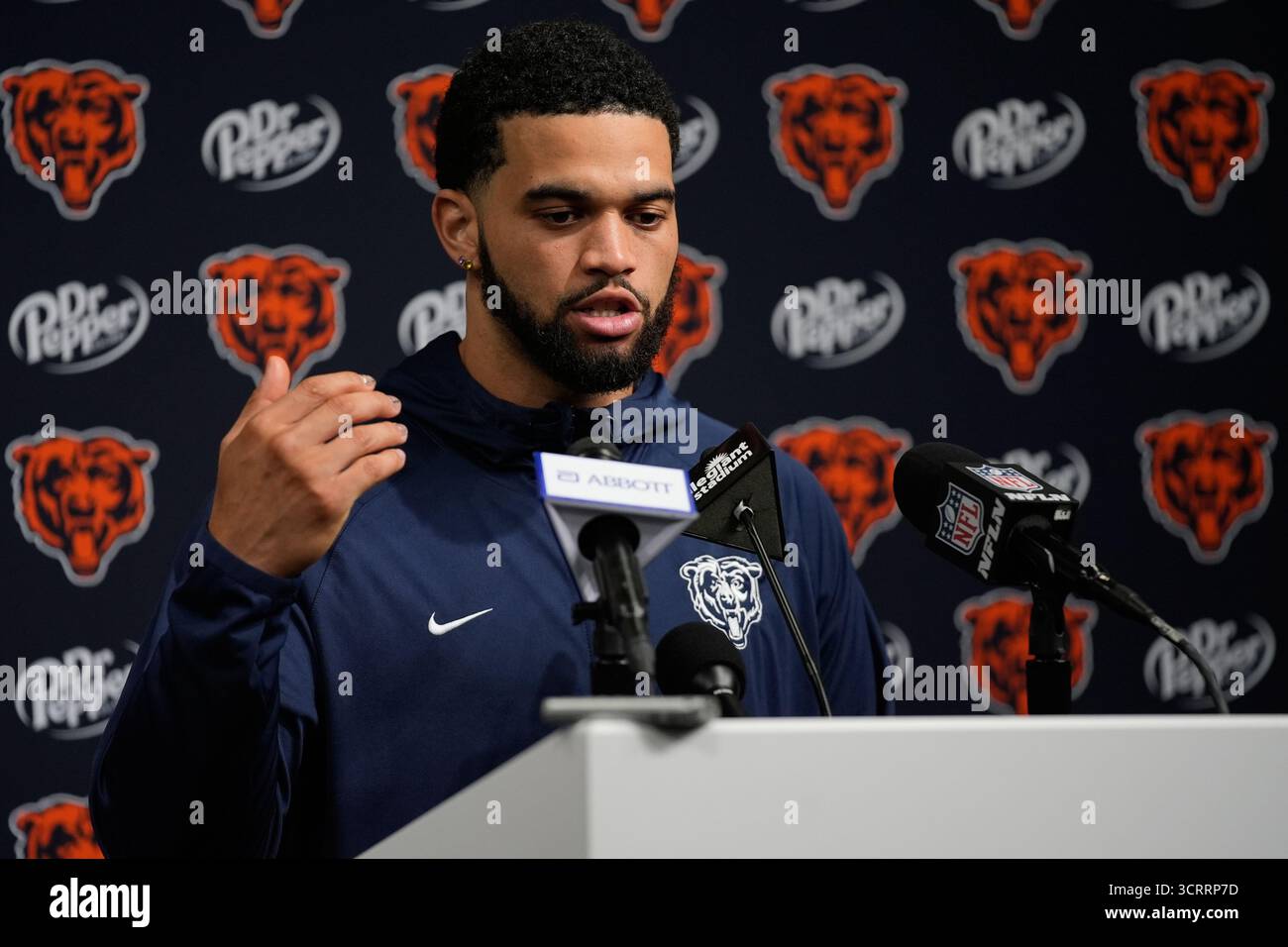 Chicago Bears quarterback Caleb Williams (18) speaks during a news ...
