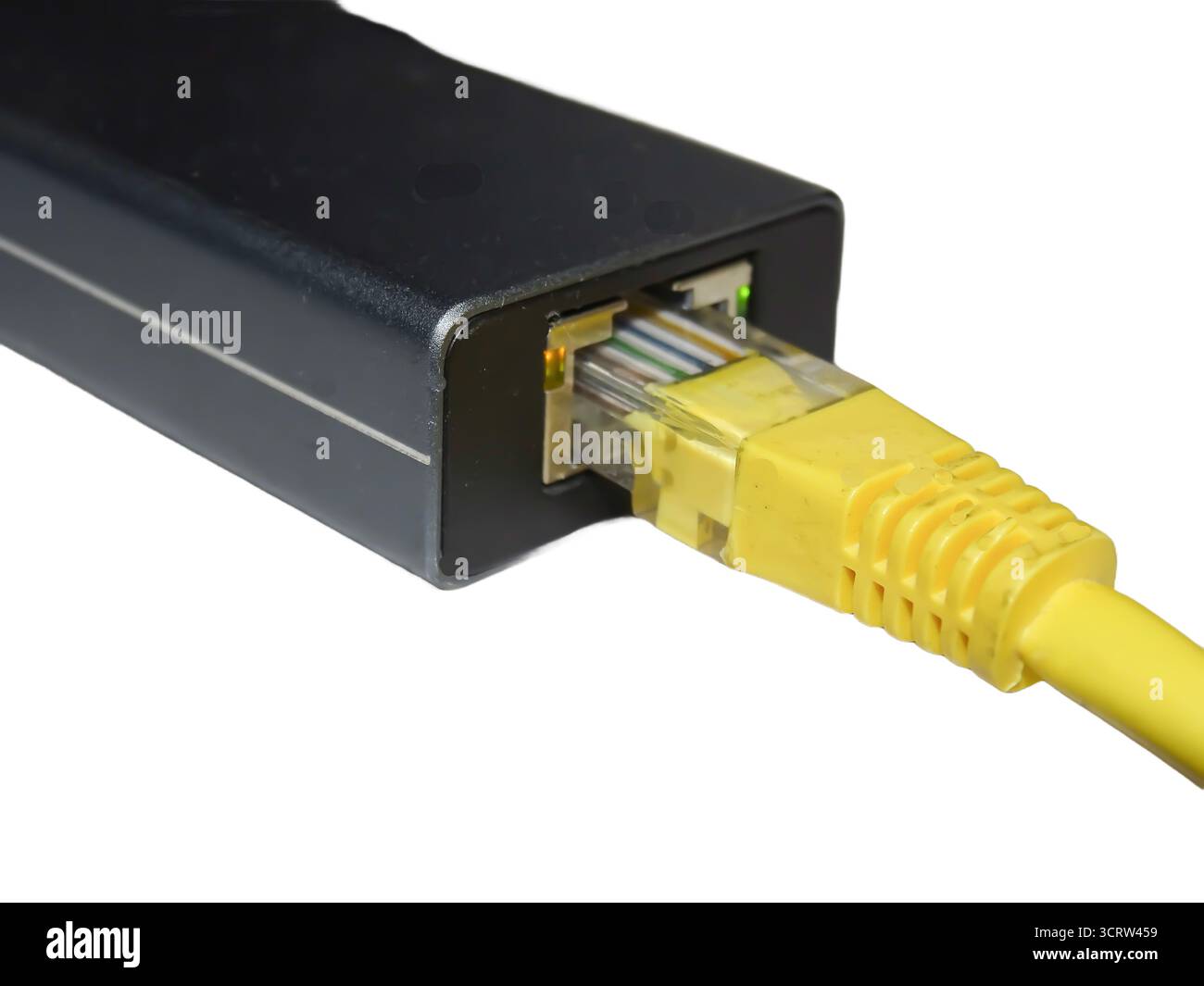 Internet cable connected to a multi-functional USB-C Hub station, Ethernet Stock Photo