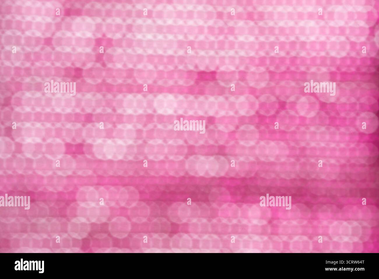 Pink bokeh abstract background, defocused lights. Pink background Stock Photo