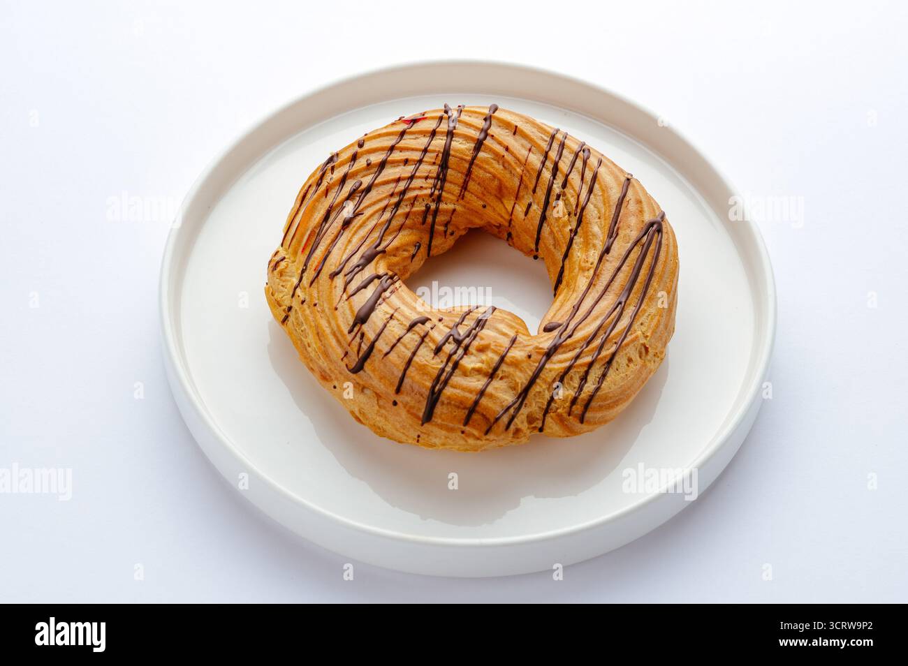 curd ring on a plate with chocolate Stock Photo