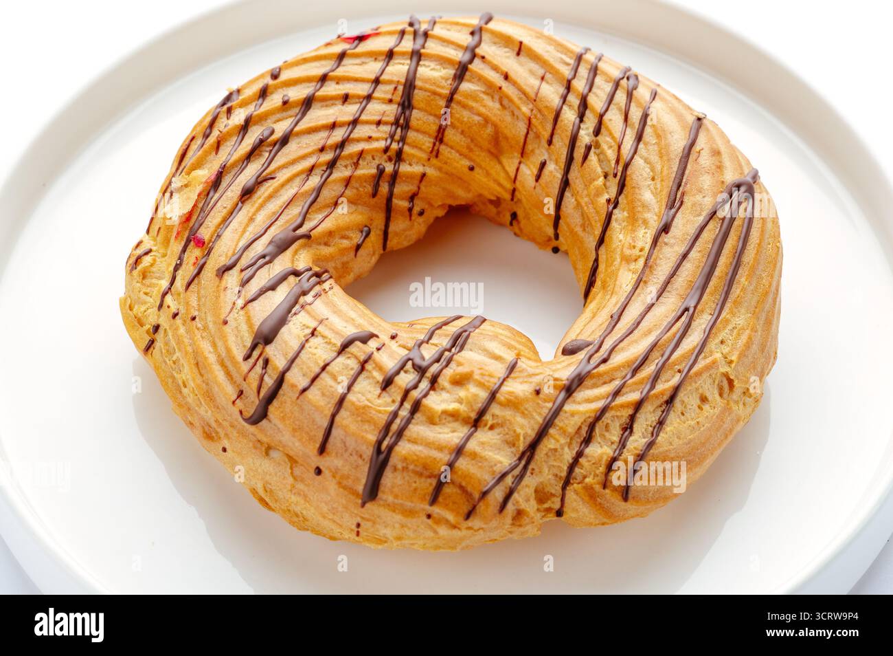 curd ring on a plate with chocolate Stock Photo