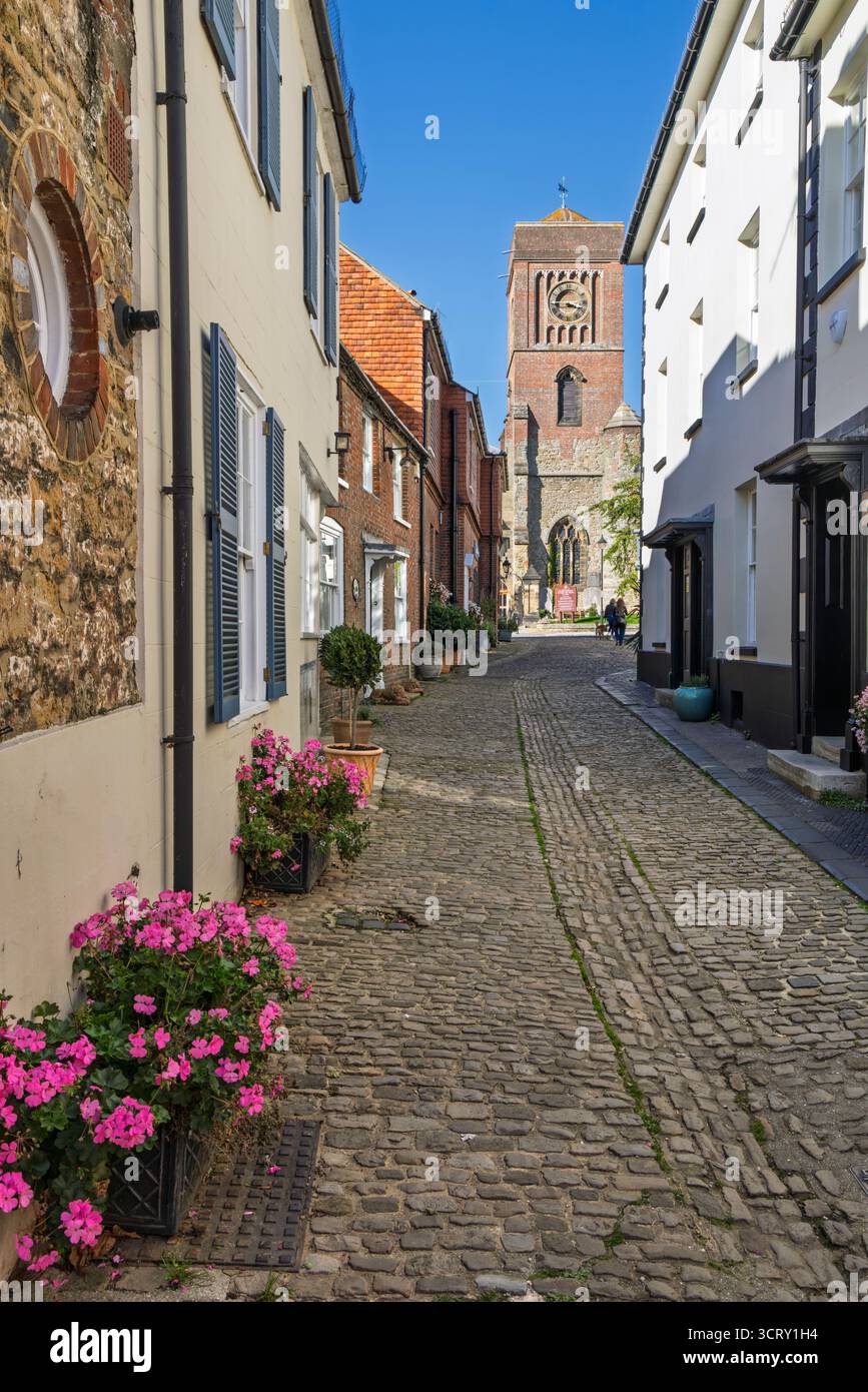 View along cobbled Lombard Street with church of Saint Mary the Virgin, Petworth, West Sussex, England, United Kingdom, Europe Stock Photo