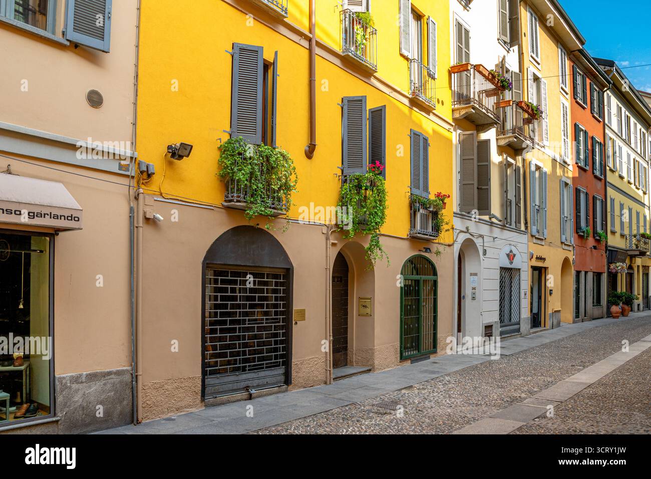 Apartments with balconies on Via Madonnina ,a picturesque narrow street in the Brera district of Milan ,Italy Stock Photo
