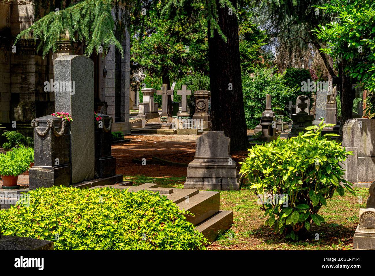 Chapels and artistic tombs and monuments in the Cimitero Monumentale di Milano,the Monumental Cemetery of Milan a large famous cemetery in Milan,Italy Stock Photo