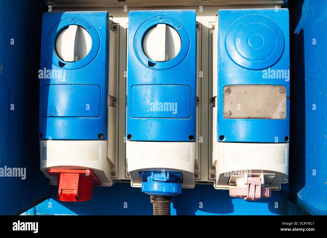 Three powerful protected high-voltage sockets. Stock Photo
