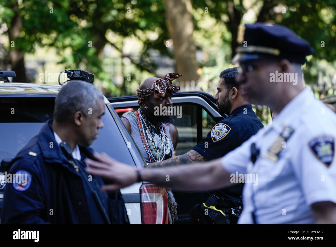 A person is detained outside the Manhattan federal court during the