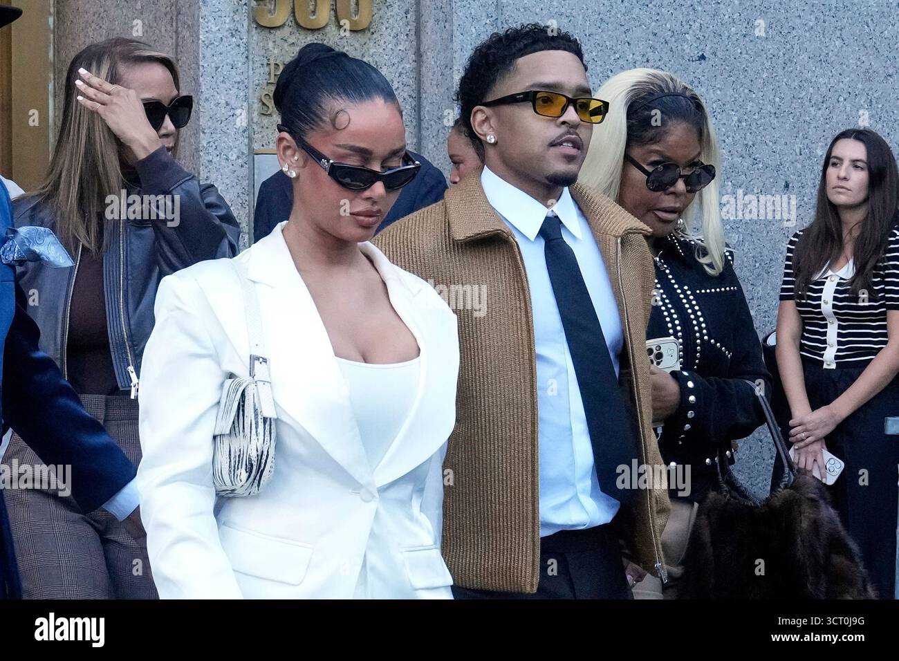 Justin Combs, center right, Sean 'Diddy'' Combs' son, leaves Federal ...