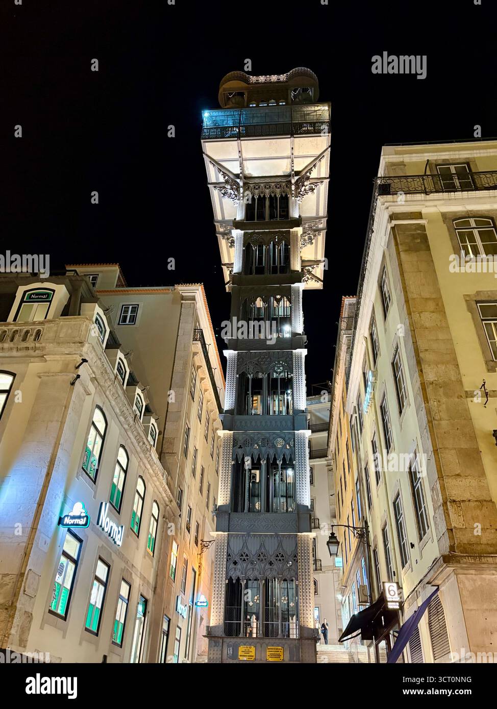 Lisbon, Portugal, Santa Justa Lift , Elevador de Santa Justa, night time view illuminated against dark sky, linking the Baixa with the Bairro Alto - Smartphone Captured Stock Image