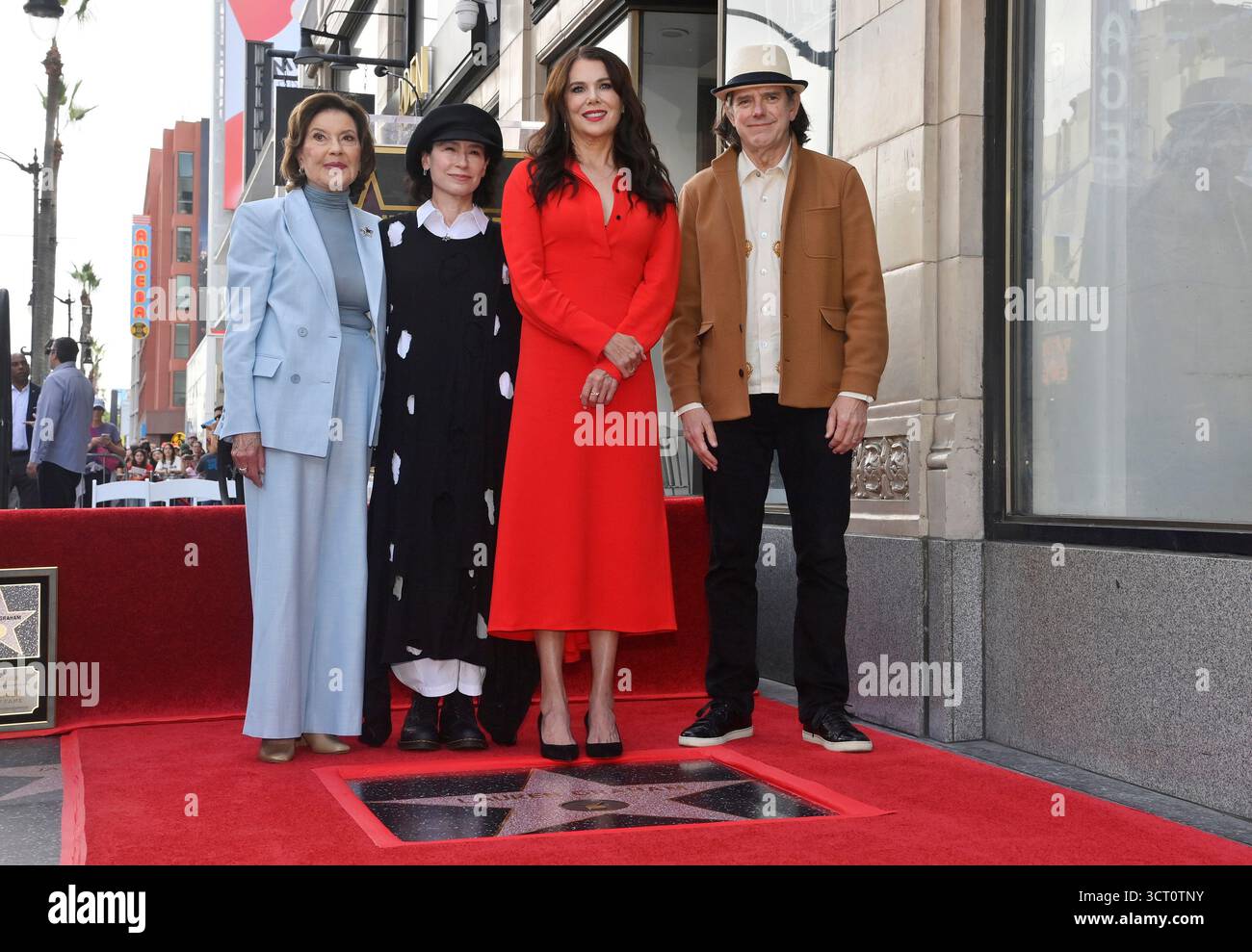 Los Angeles, United States. 03rd Oct, 2025. Actress Lauren Graham (red dress) is joined by Kelly Bishop, Amy Sherman-Palladino, and Daniel Palladino (L-R) during an unveiling ceremony honoring her with the 2,823rd star on the Hollywood Walk of Fame in Los Angeles on Friday, October 3, 2025. Photo by Jim Ruymen/UPI Credit: UPI/Alamy Live News Stock Photo