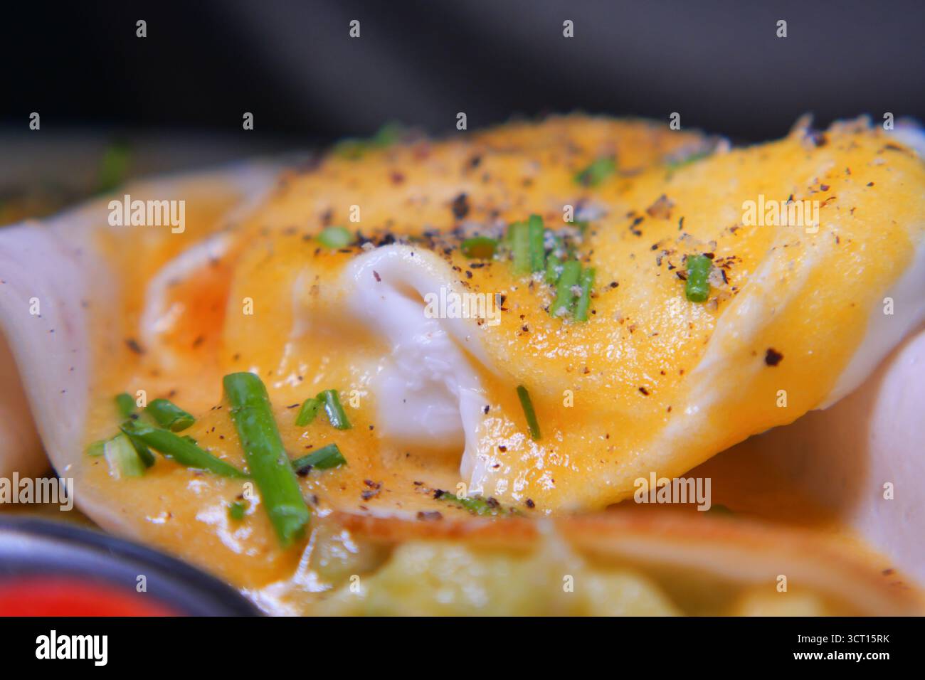 Delicious eggs benedict served on a plate Stock Photo