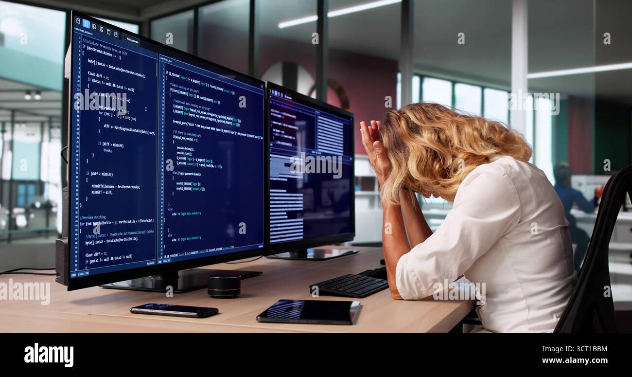 Bored Female Software Developer Web Programmer In Business Coding. Stock Photo