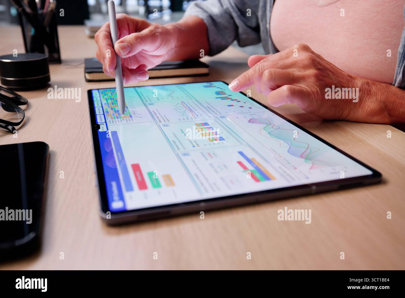 Data Analyst Using Data Analytics KPI Dashboard Stock Photo